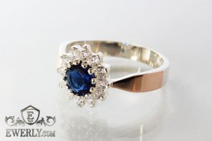 Женское серебряное кольцо - звезда с золотом и синим фианитом, фото